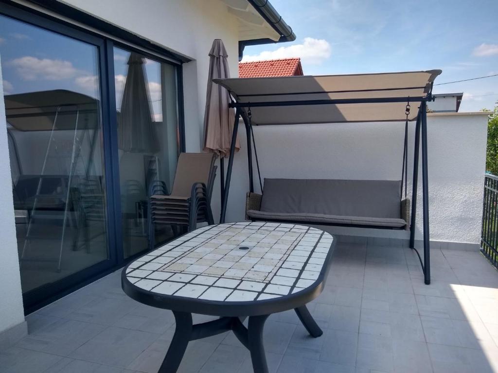 Balkón nebo terasa v ubytování Tandem apartman
