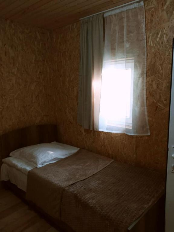 Postel nebo postele na pokoji v ubytování Guesthouse Sagrila