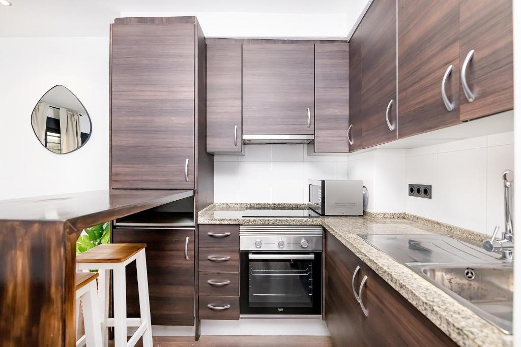 Kuchyňa alebo kuchynka v ubytovaní Exclusivo Dúplex Dos Aceras