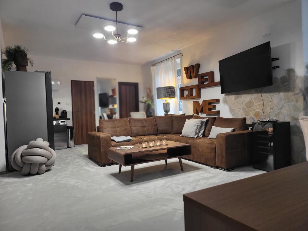 Μια τηλεόραση ή/και κέντρο ψυχαγωγίας στο Apartment Villa Hřensko 132