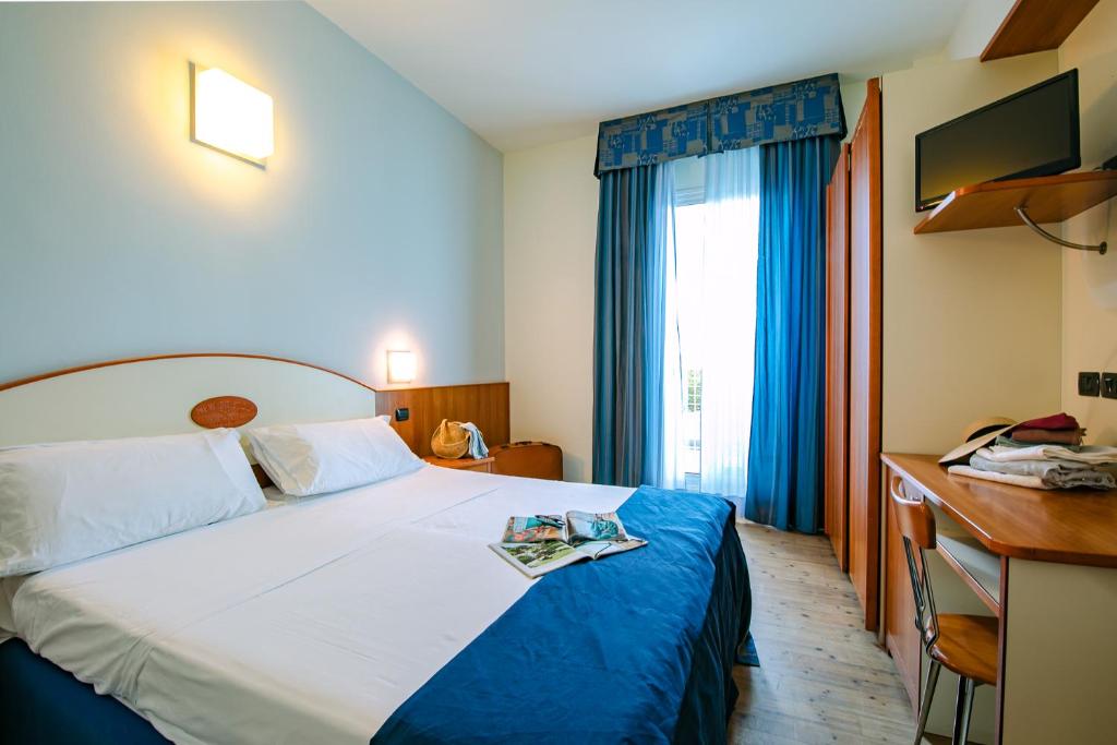 Posteľ alebo postele v izbe v ubytovaní New Bristol Sport Hotel