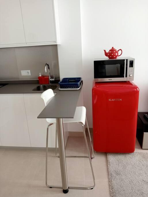 Kuchyňa alebo kuchynka v ubytovaní Apartamentos Tras dos Fornos