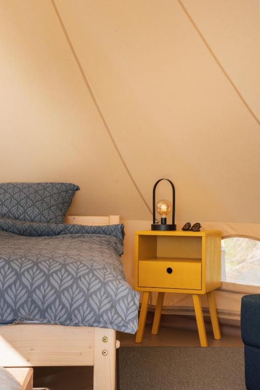 Postel nebo postele na pokoji v ubytování Mönus Paik Glamping