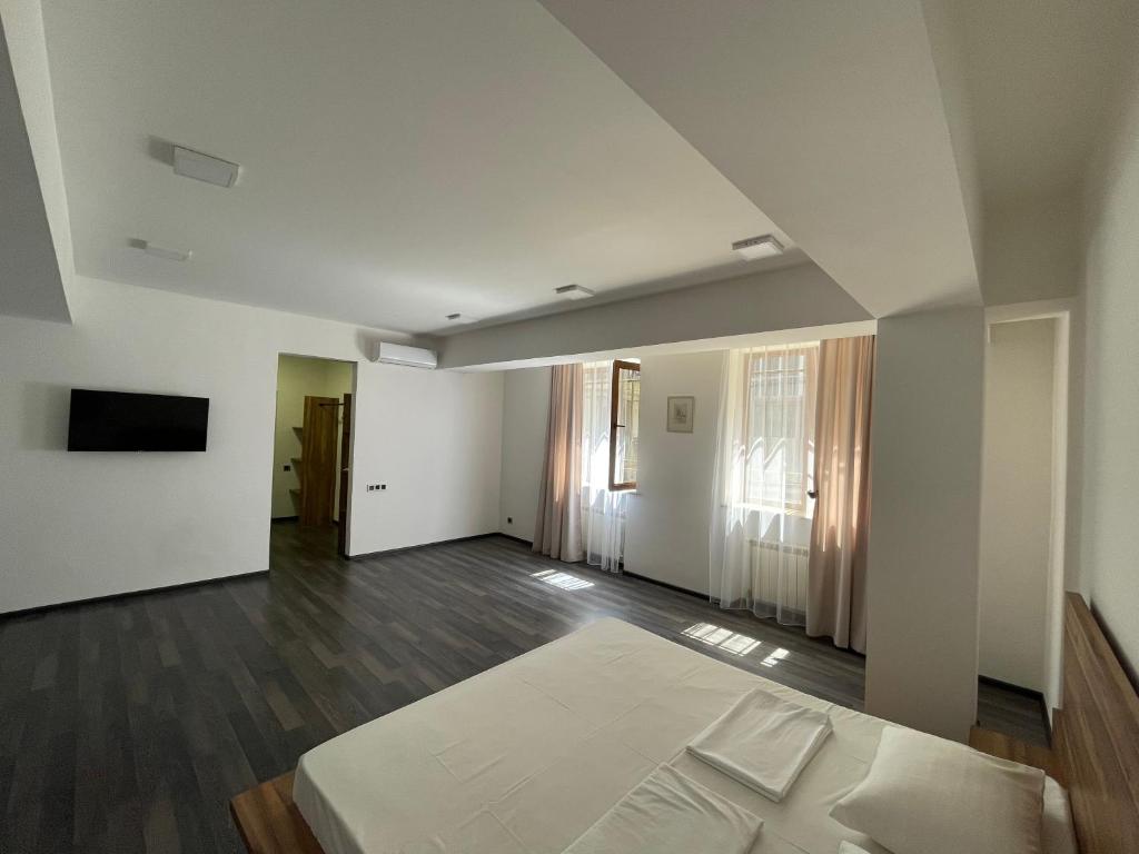 TV a/nebo společenská místnost v ubytování One Day Hotel