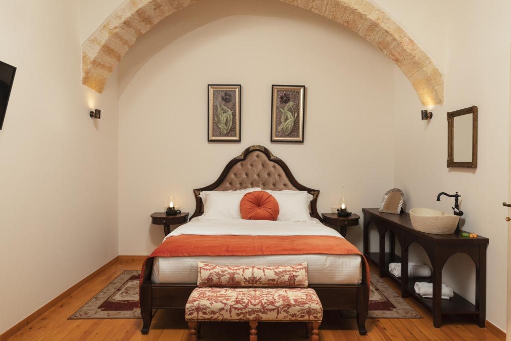 Postel nebo postele na pokoji v ubytování Nobili Boutique Hotel