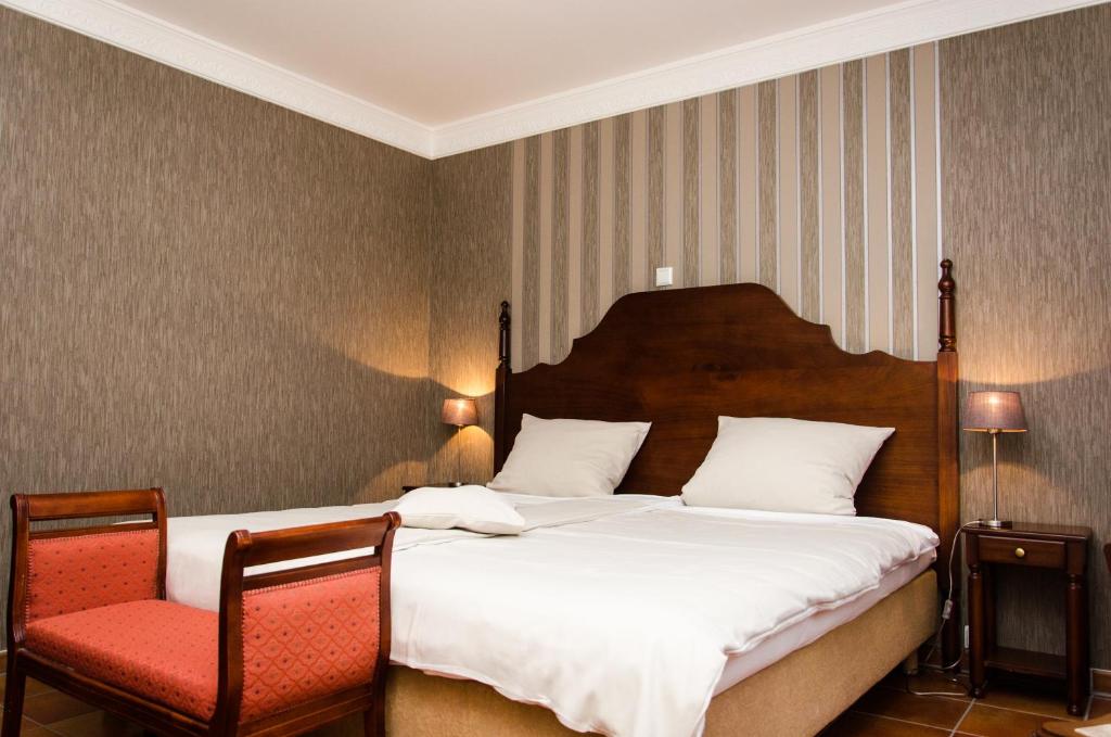 Postel nebo postele na pokoji v ubytování Hotel Borchers