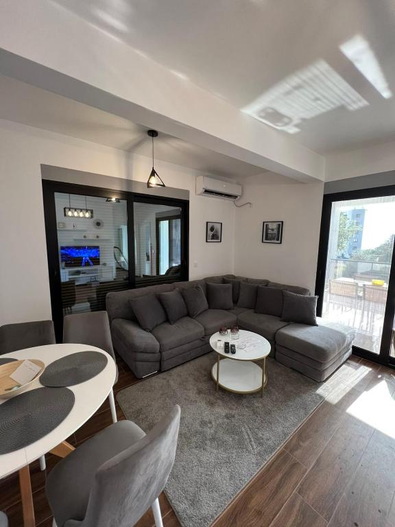 Posedenie v ubytovaní APARTMENT DZANA