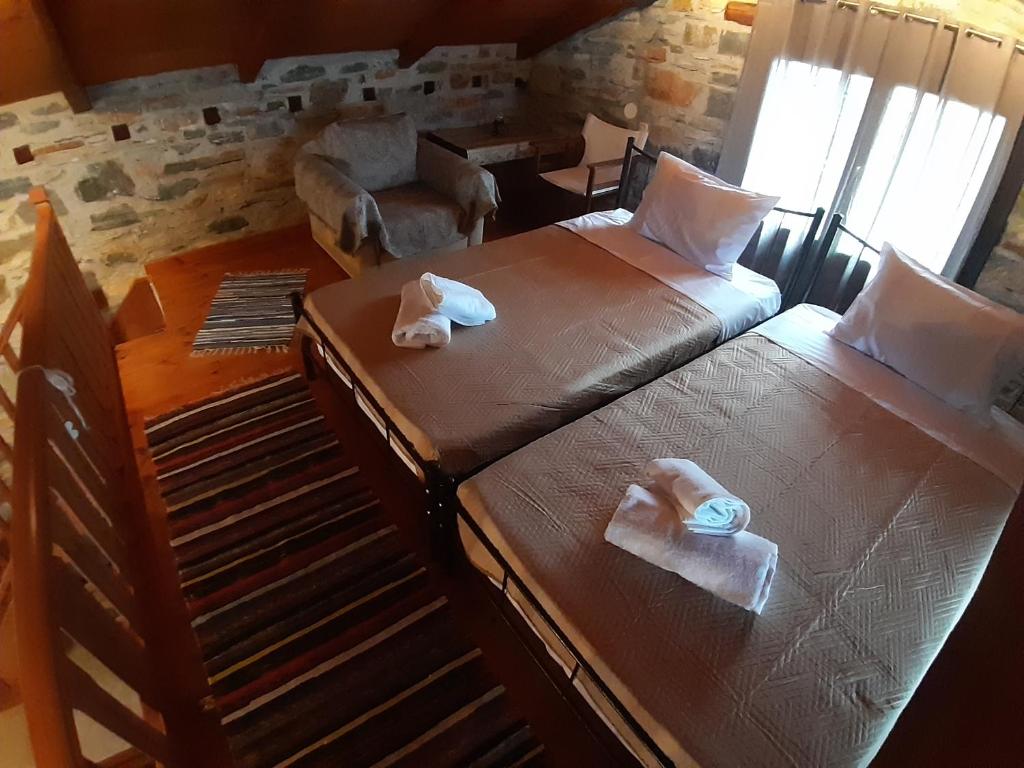 Postel nebo postele na pokoji v ubytování LIMNIONAS SUNVIEW