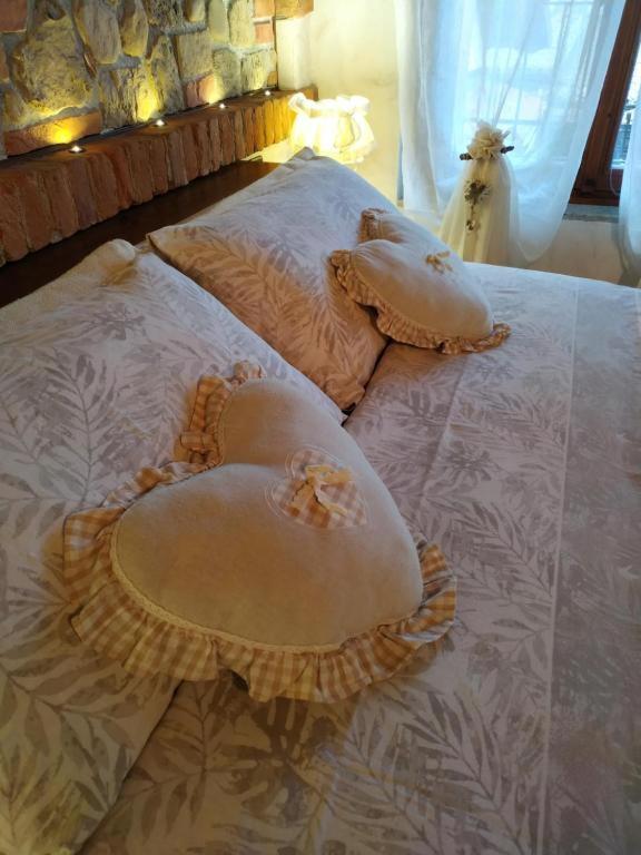 Łóżko lub łóżka w pokoju w obiekcie Bed And Breakfast Olimpia