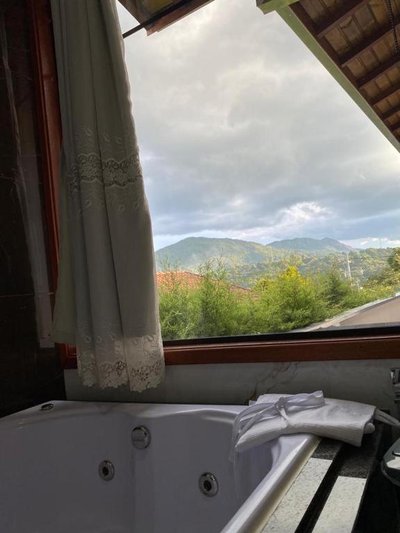 Pousada Posto Monte Verde - Habitación Cuádruple Con Baño