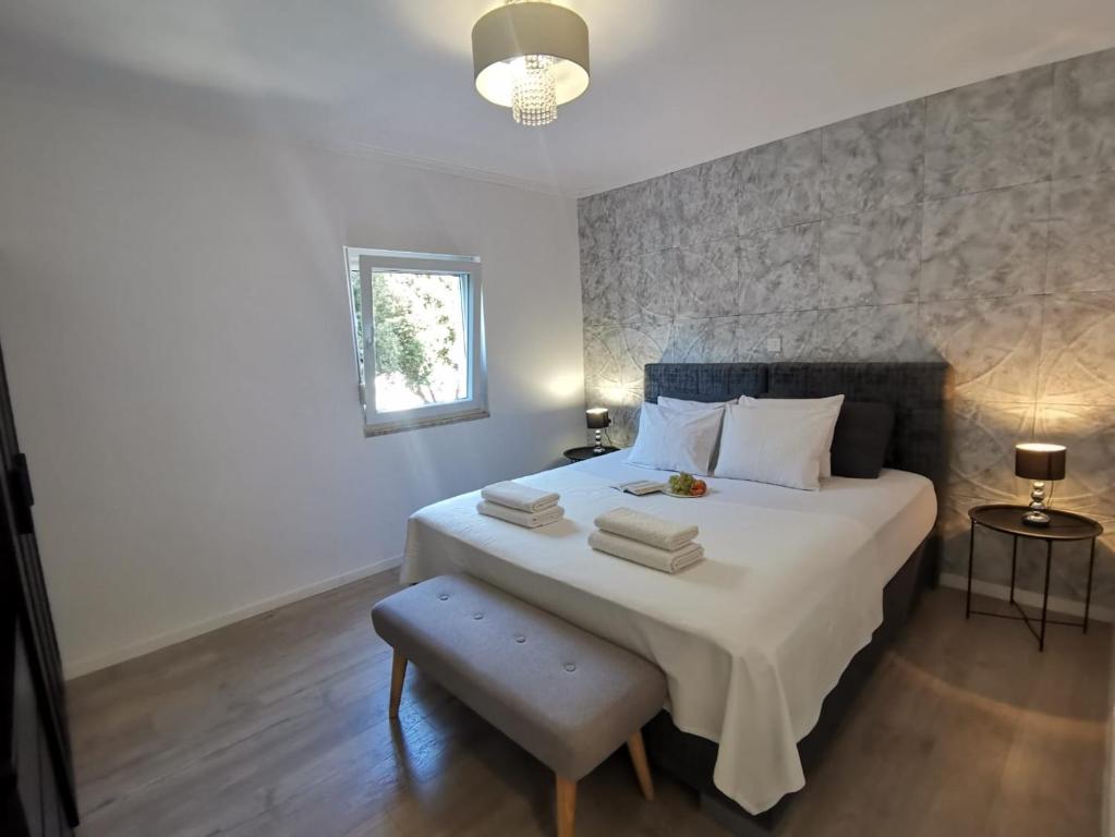 Ένα ή περισσότερα κρεβάτια σε δωμάτιο στο Apartments MilaRoza