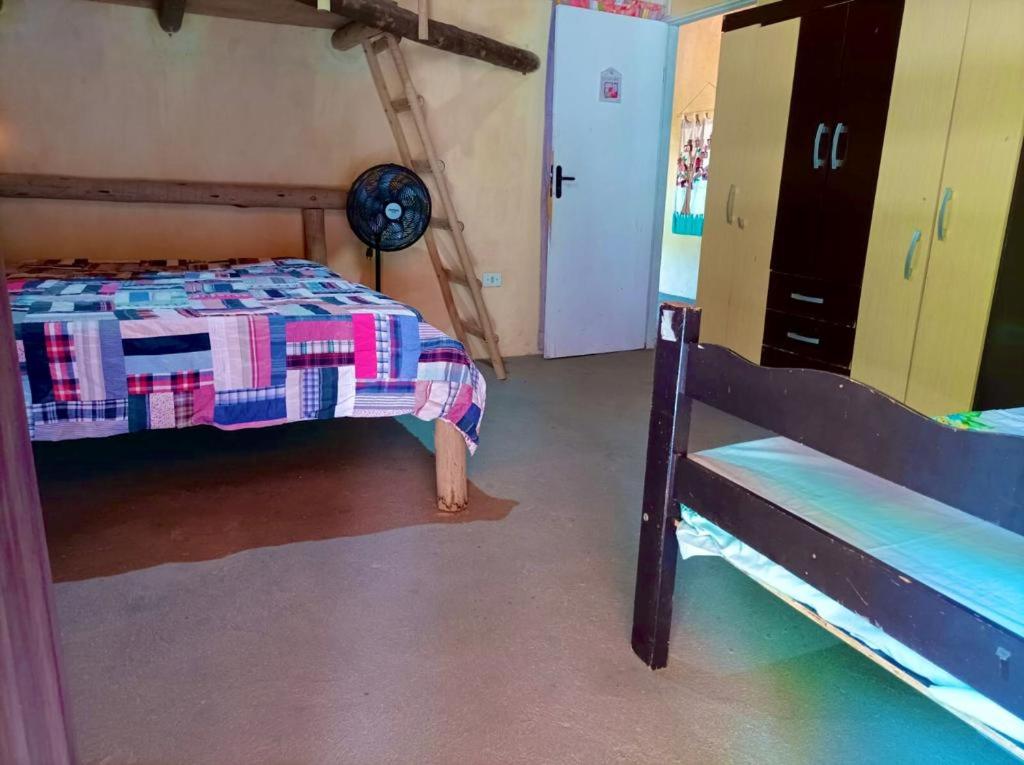 Postel nebo postele na pokoji v ubytování Rancho Colcha de Retalho