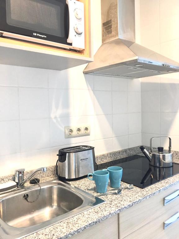 Kuchyň nebo kuchyňský kout v ubytování Cozzy Apartment con vista al mar