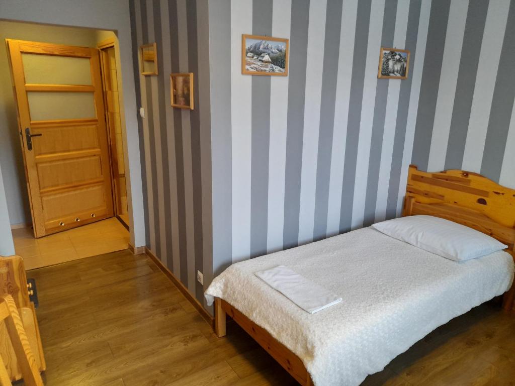 Posteľ alebo postele v izbe v ubytovaní EMAR