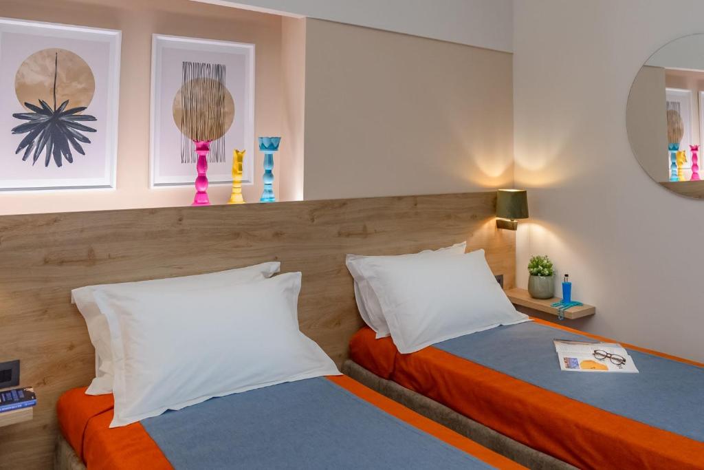 Postel nebo postele na pokoji v ubytování Macramè Fazello Rooms