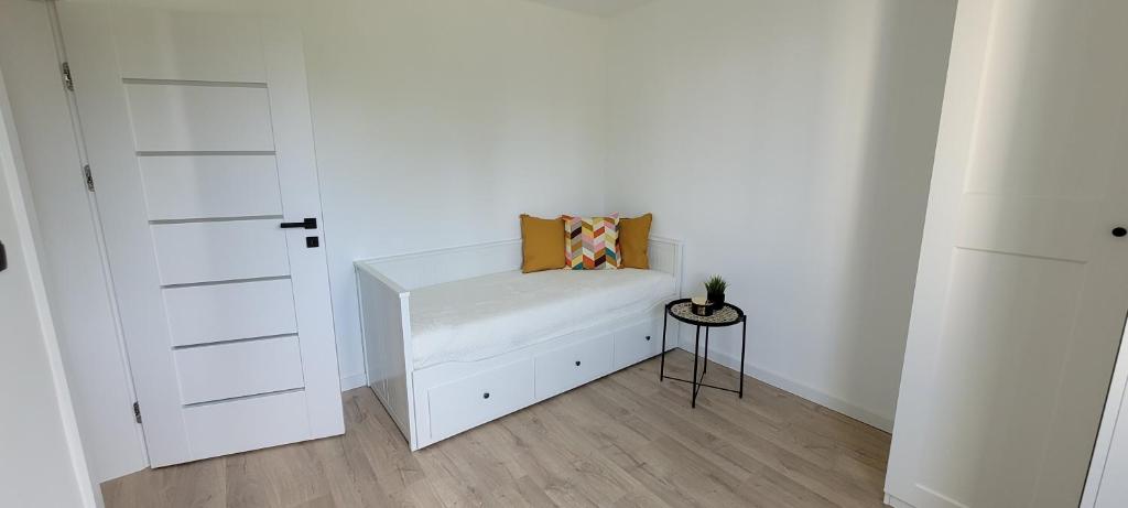 Posteľ alebo postele v izbe v ubytovaní Apartament Lato Nad Morzem