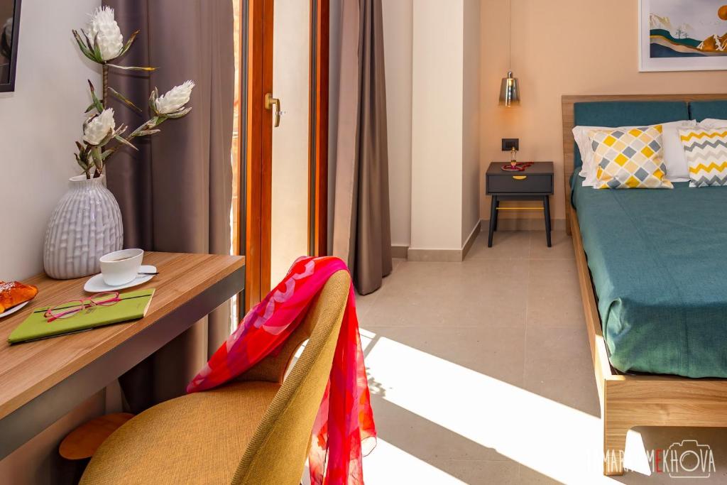 Postel nebo postele na pokoji v ubytování Macramè Fazello Rooms