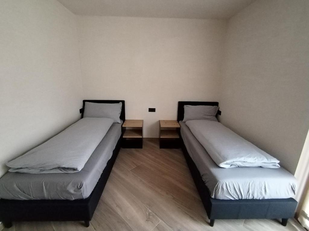Łóżko lub łóżka w pokoju w obiekcie Chalet MAOL Luxury Living