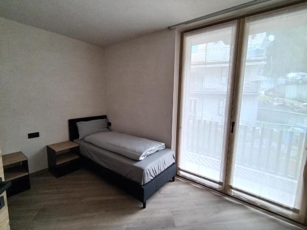 Łóżko lub łóżka w pokoju w obiekcie Chalet MAOL Luxury Living