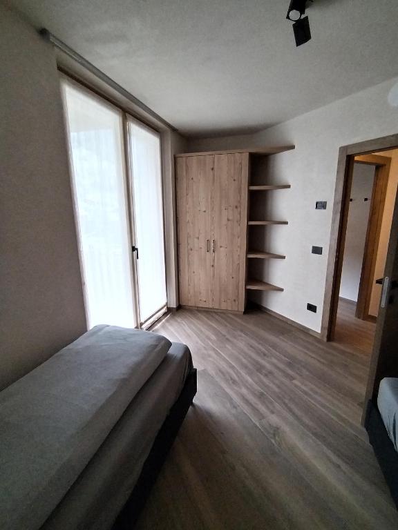Łóżko lub łóżka w pokoju w obiekcie Chalet MAOL Luxury Living