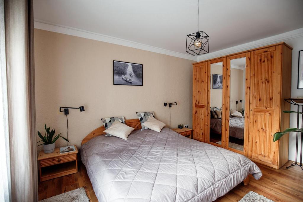 Posteľ alebo postele v izbe v ubytovaní Csendeskert Wellness Apartments - Garden, grill, chill