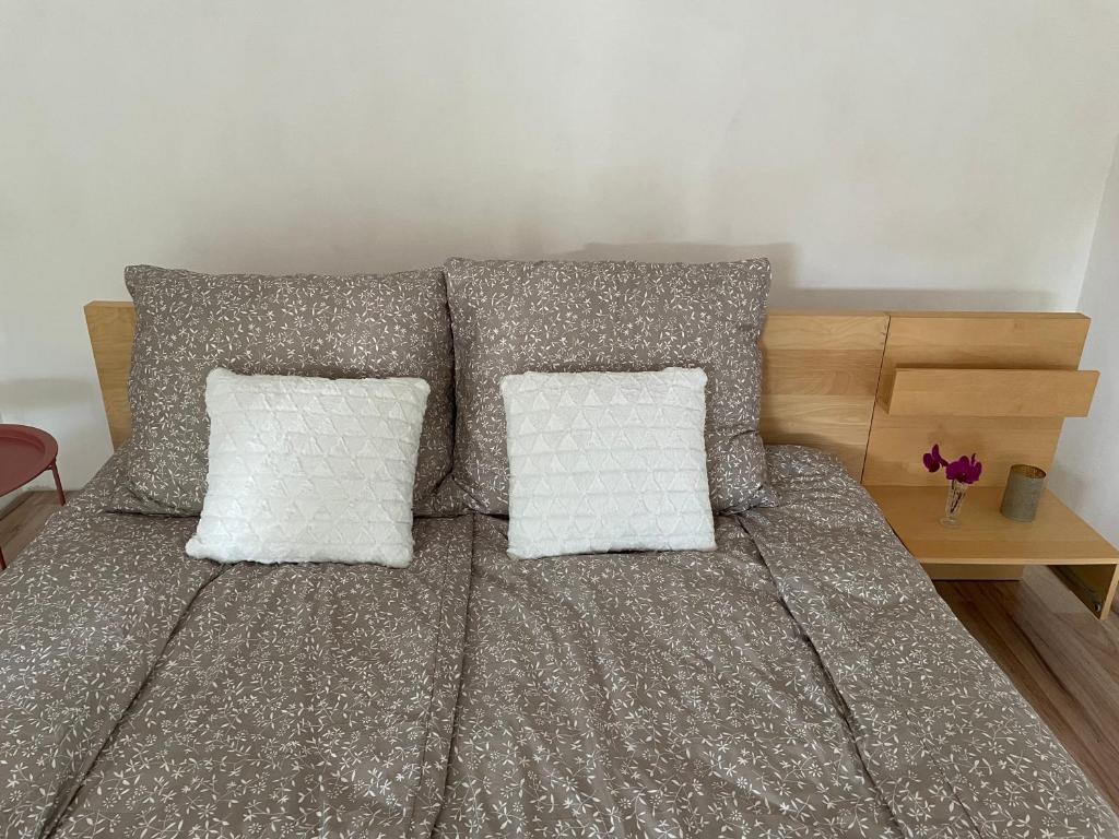 Posteľ alebo postele v izbe v ubytovaní BONI Apartman