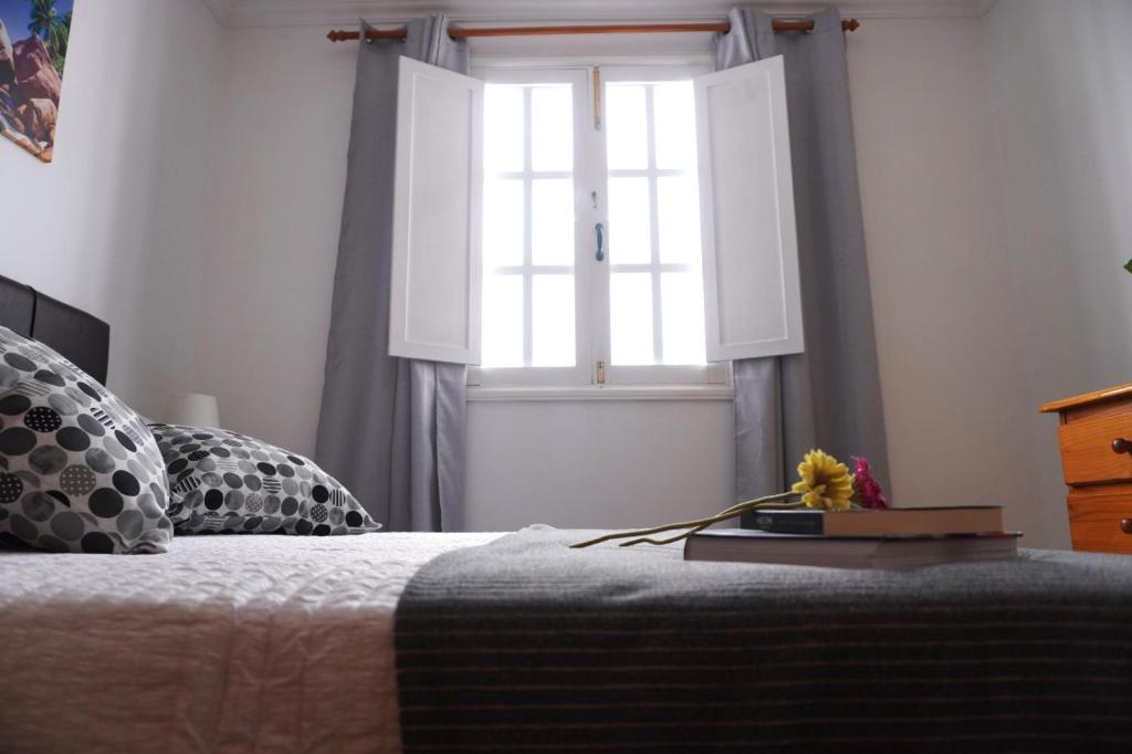 A bed or beds in a room at Apto. Guacimeta, a 20m de la playa.