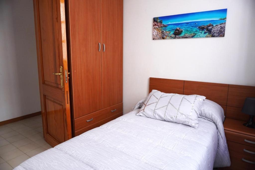 A bed or beds in a room at Apto. Guacimeta, a 20m de la playa.