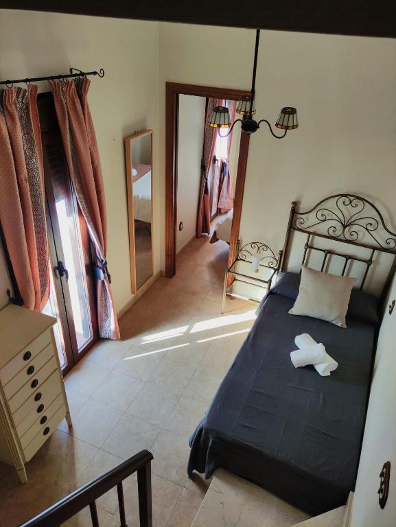 Postel nebo postele na pokoji v ubytování Casita Jade