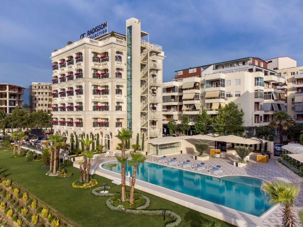 an image of a hotel with a swimming pool at Radisson Collection Morina Hotel, Tirana in Tirana