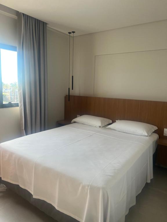 Postel nebo postele na pokoji v ubytování Salinas Premium Resort
