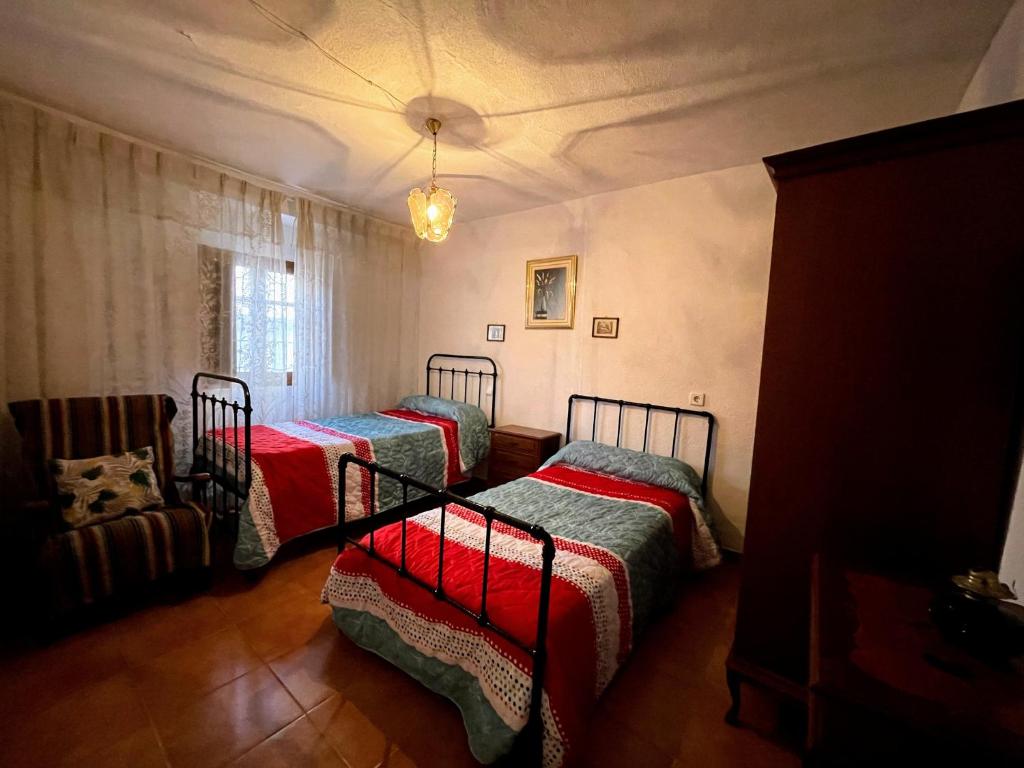 Postel nebo postele na pokoji v ubytování La Trilla