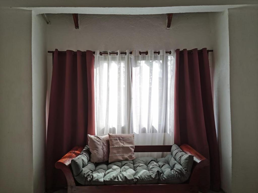 Postel nebo postele na pokoji v ubytování Yas villas homestay