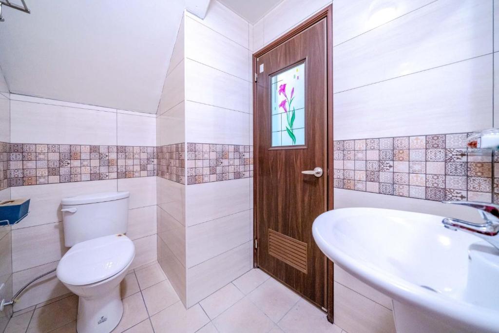 Koupelna v ubytování 3Kiss Homestay