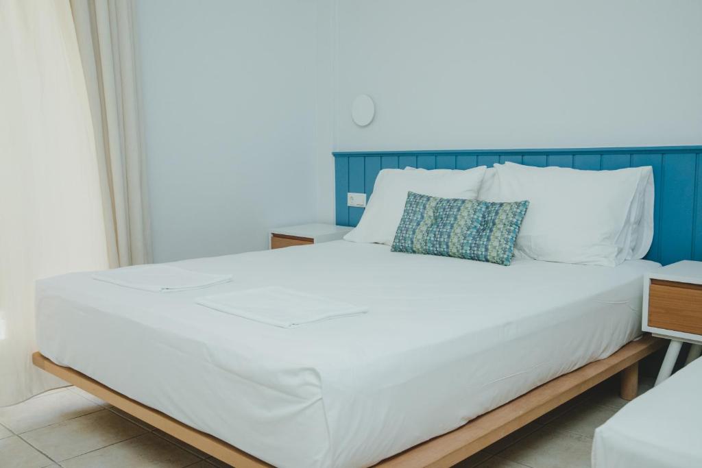 Postel nebo postele na pokoji v ubytování Elektra Comfort Hotel by Del Mare
