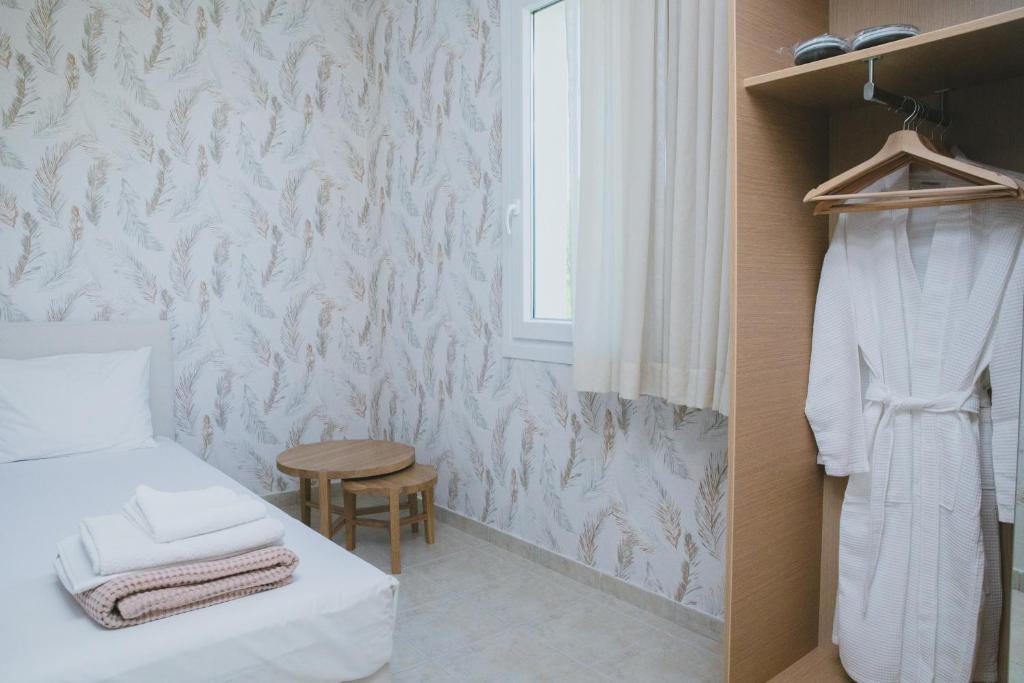 Postel nebo postele na pokoji v ubytování Elektra Comfort Hotel by Del Mare