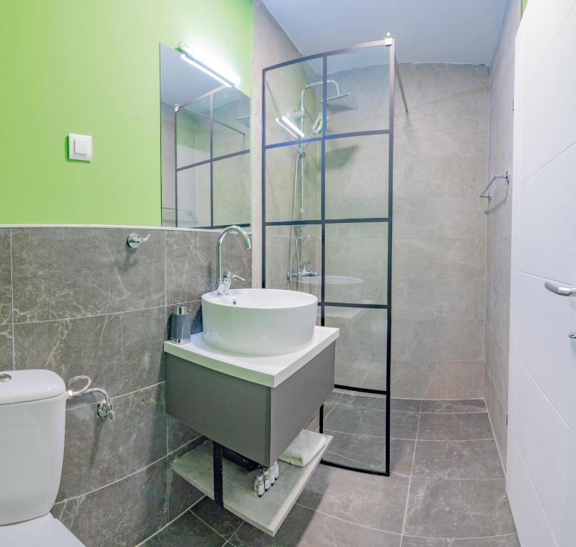 Koupelna v ubytování AGH Elite Apartments & Studios
