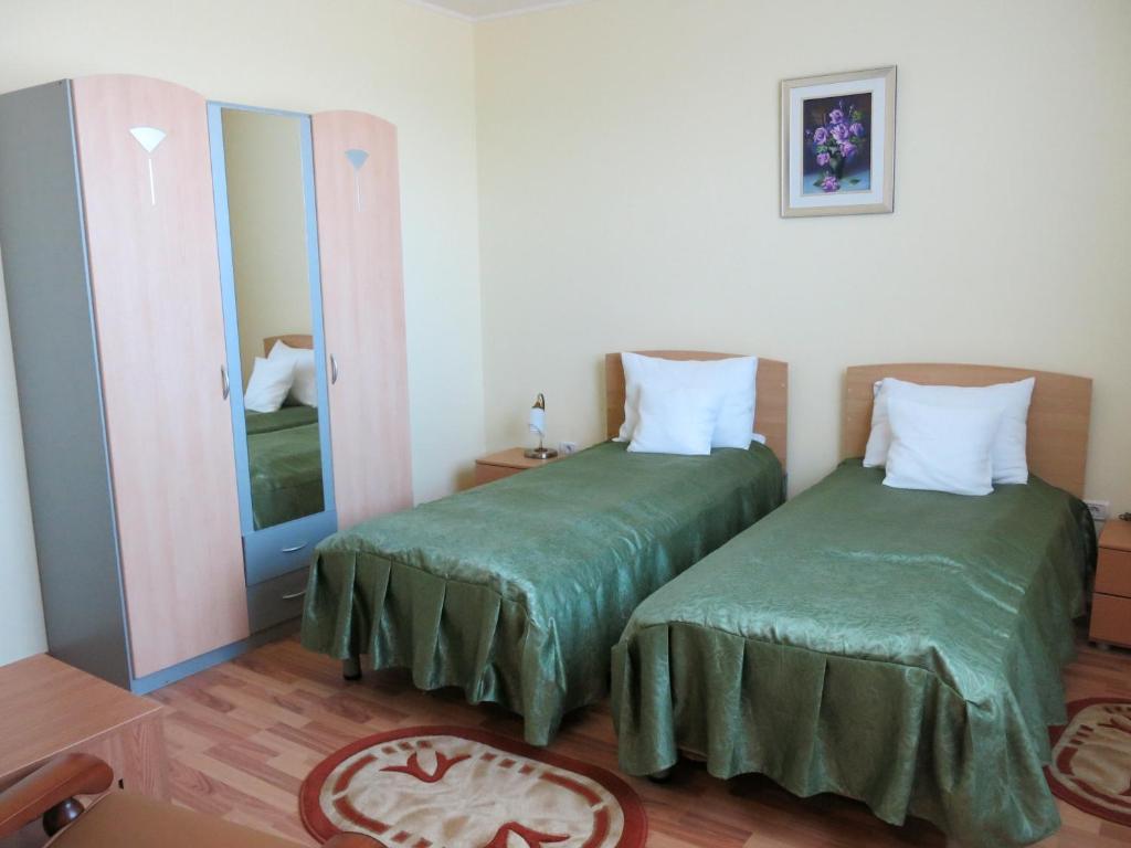 Postel nebo postele na pokoji v ubytování Conacul de pe Lac