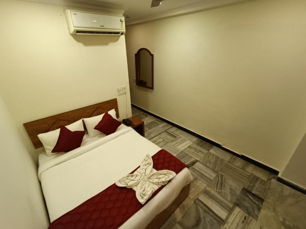 Postel nebo postele na pokoji v ubytování GT Grande Hotel-Near US Consulate