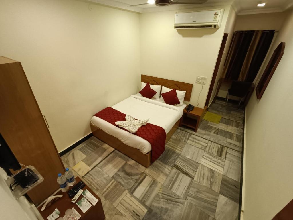 Postel nebo postele na pokoji v ubytování GT Grande Hotel-Near US Consulate