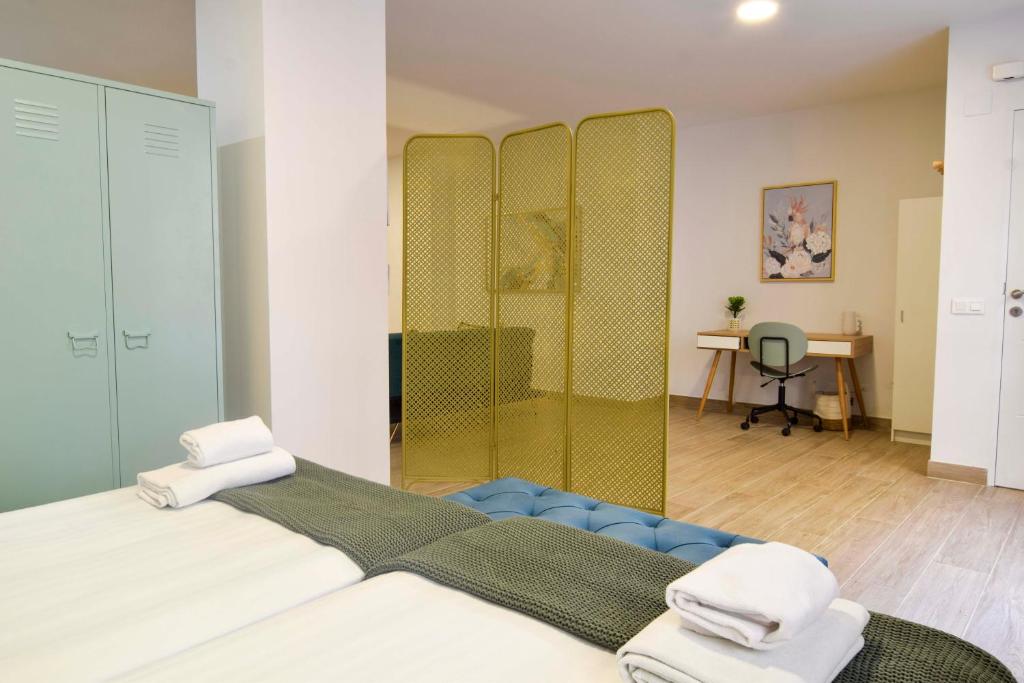 Posteľ alebo postele v izbe v ubytovaní Salitre FreshApartments