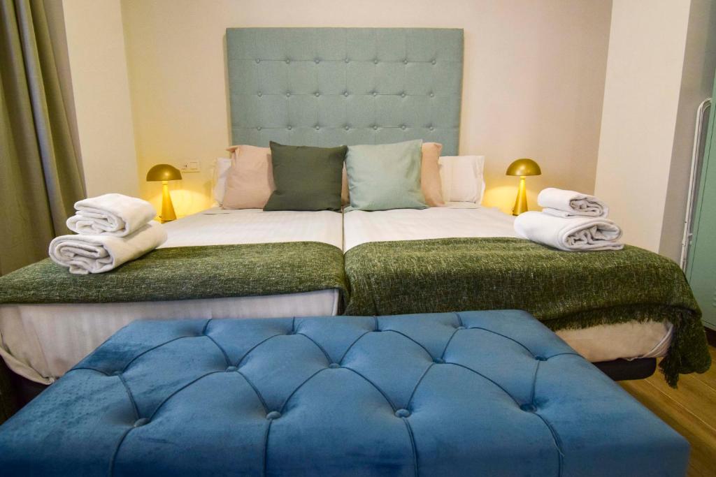 Posteľ alebo postele v izbe v ubytovaní Salitre FreshApartments