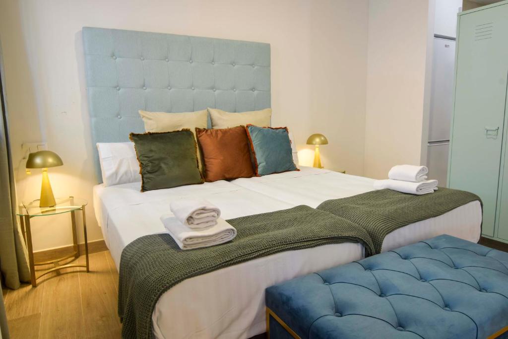 Posteľ alebo postele v izbe v ubytovaní Salitre FreshApartments