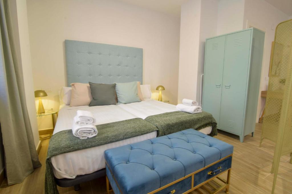 Posteľ alebo postele v izbe v ubytovaní Salitre FreshApartments