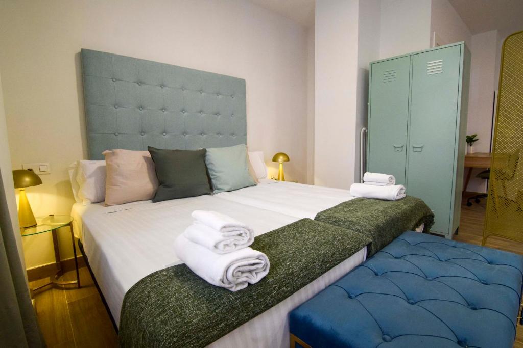 Posteľ alebo postele v izbe v ubytovaní Salitre FreshApartments