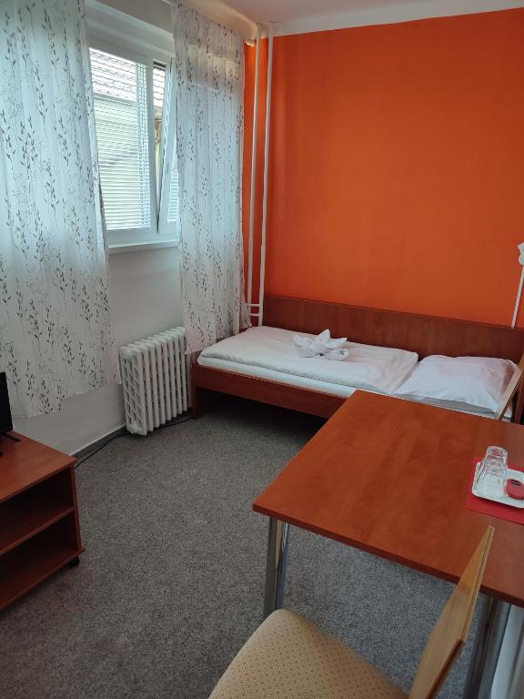 Postel nebo postele na pokoji v ubytování BEST Hotel Garni