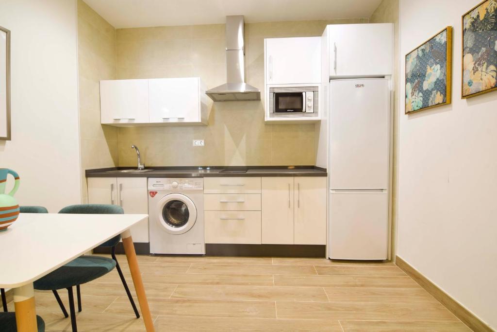 Kuchyňa alebo kuchynka v ubytovaní Salitre FreshApartments