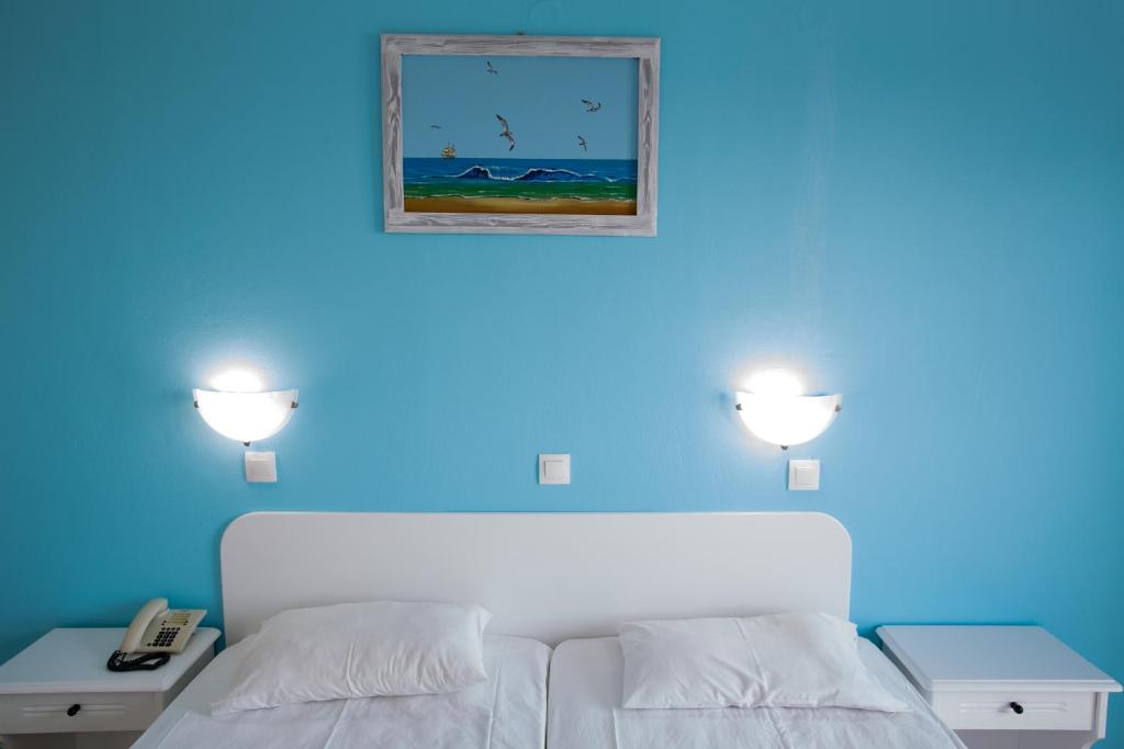Postel nebo postele na pokoji v ubytování Romantza Mare