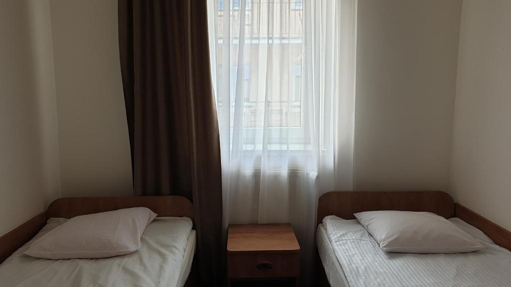 Postel nebo postele na pokoji v ubytování Paradiso Park