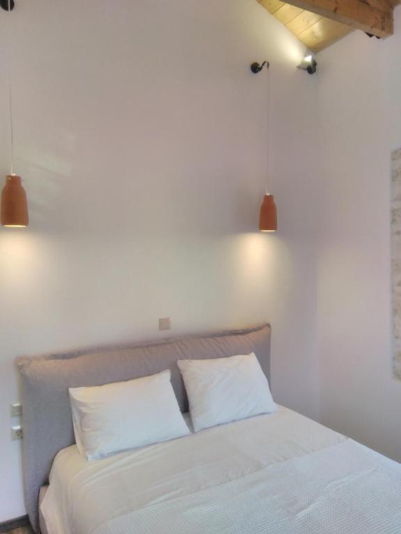 Postel nebo postele na pokoji v ubytování Mangata W suites homes private pools